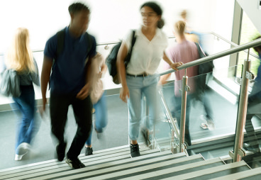 Students walking up and down stairs